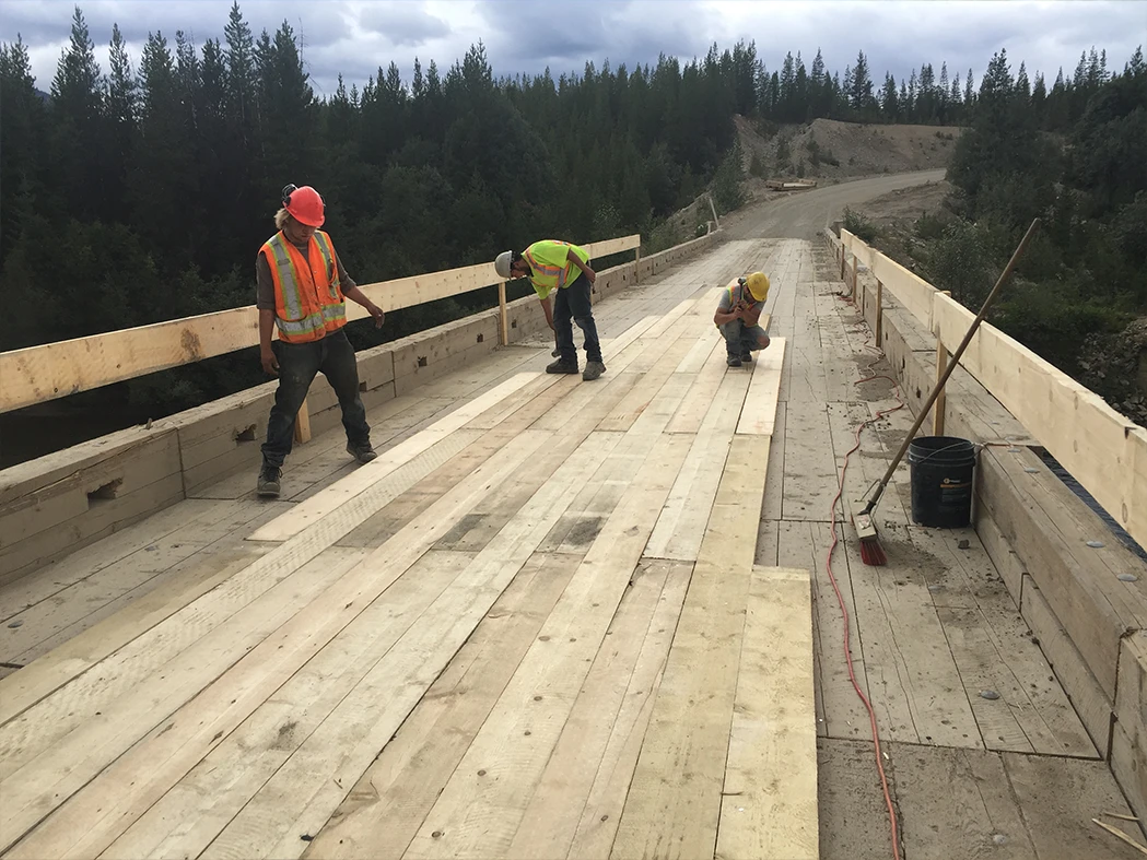Team working on bridge maintenance