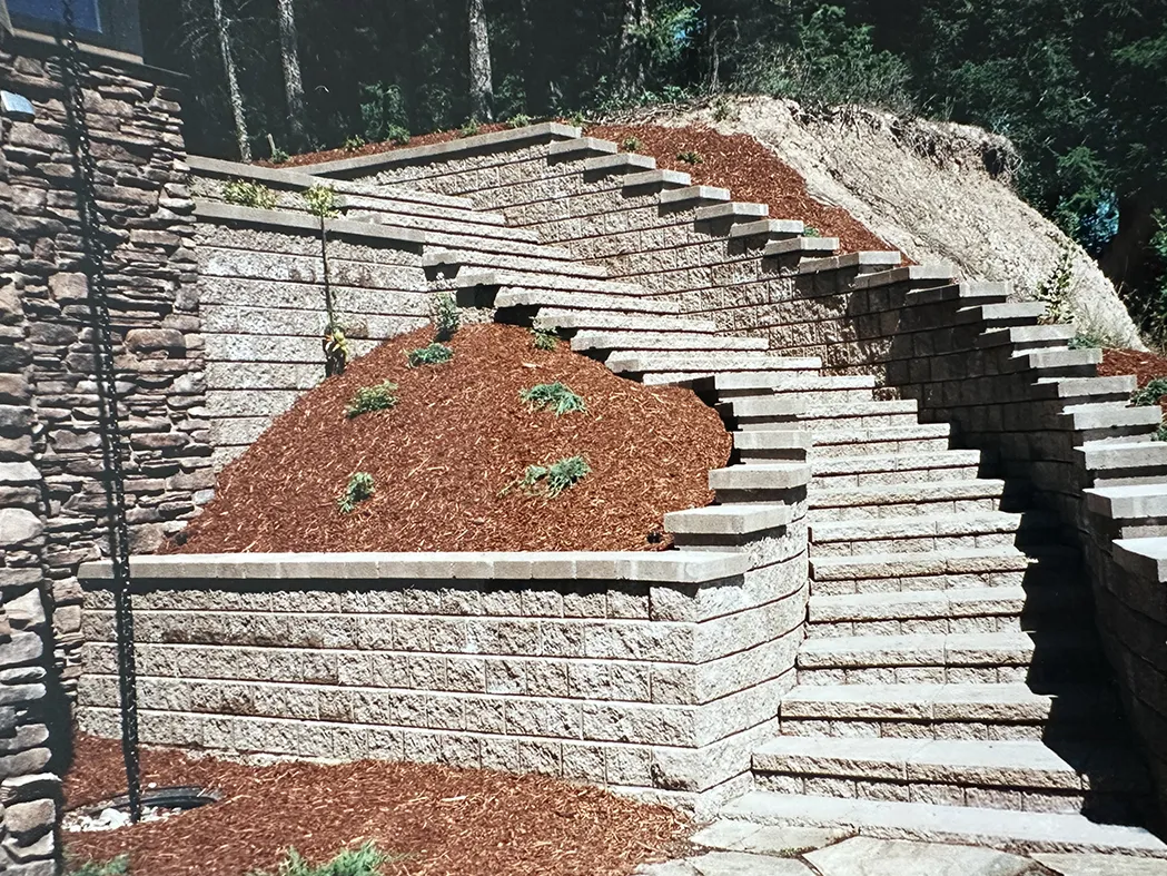 Stone retaining wall with staircase